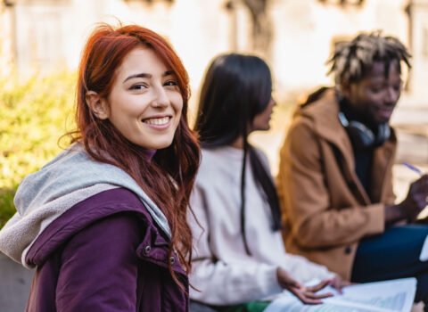 Cheerful Student Enjoying Campus Life Outdoors